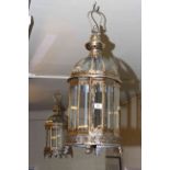 Pair of glazed and metal cylindrical hall lanterns.