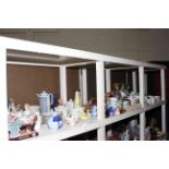 Full shelf of assorted china including two part tea services, figurines, vases, jugs, ornaments,