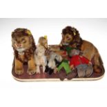 Collection of Steiff soft toys including two lions.