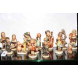 Collection of fifteen Hummel figures.