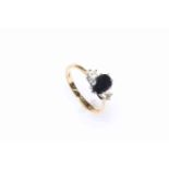 18 carat yellow gold sapphire and diamond ring, size K.