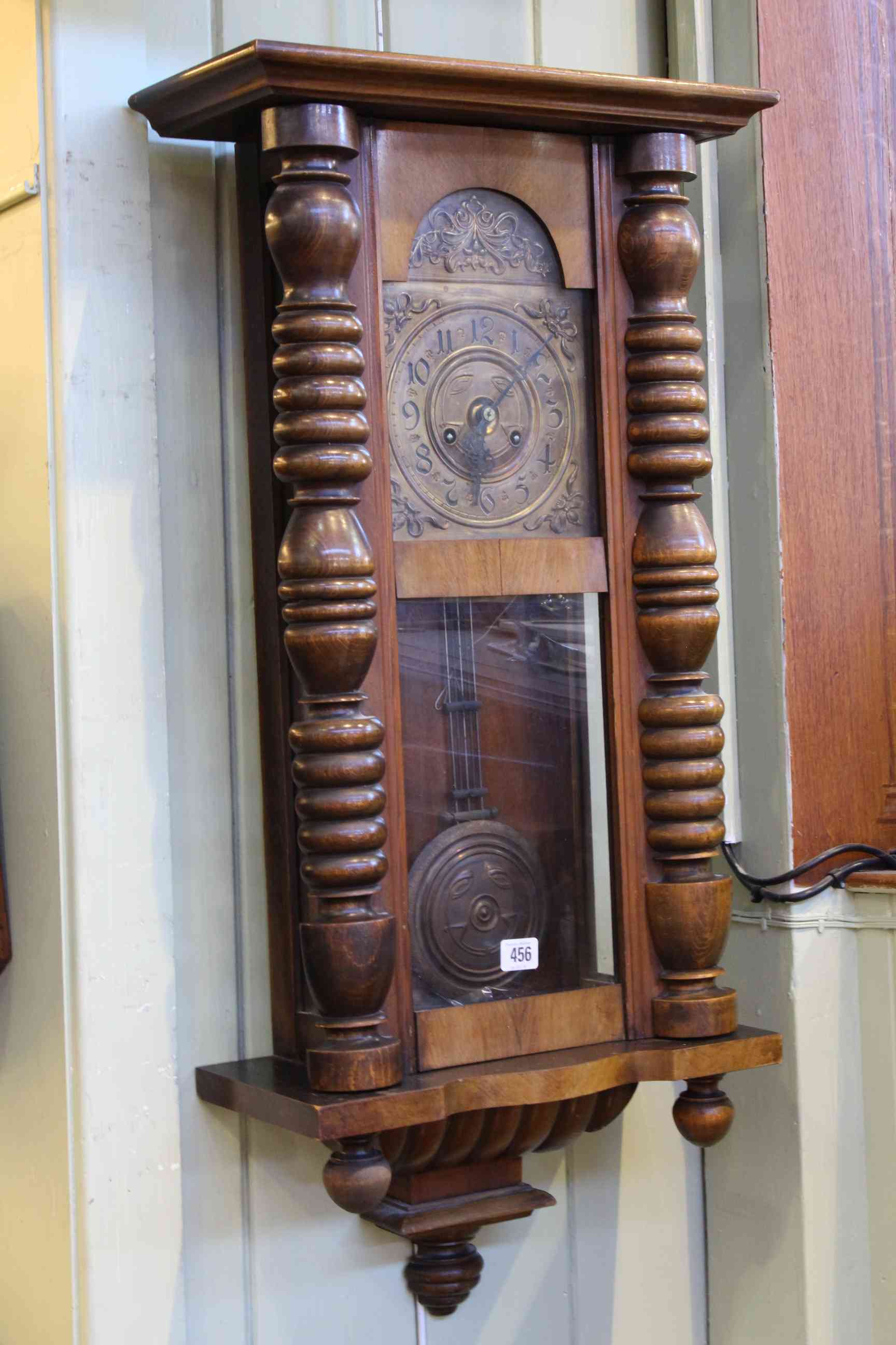 Victorian walnut cased Vienna style wall clock.