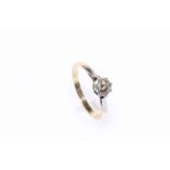 18 carat gold and platinum solitaire diamond ring, size N.