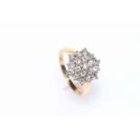 Ladies nineteen stone diamond cluster ring set in 18 carat yellow and white gold, size N.