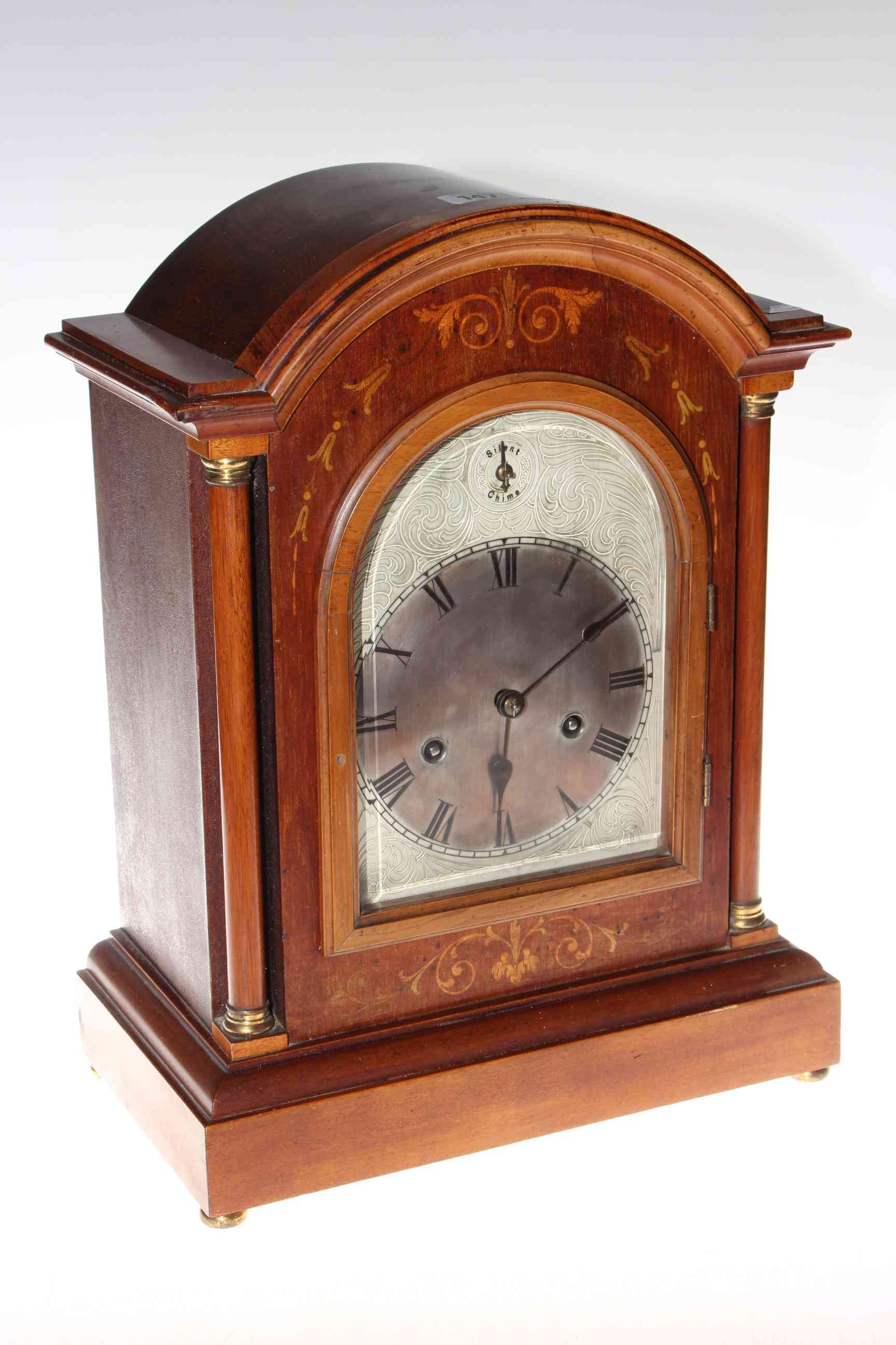 Edwardian inlaid mahogany mantel clock with silver dial, 42cm.