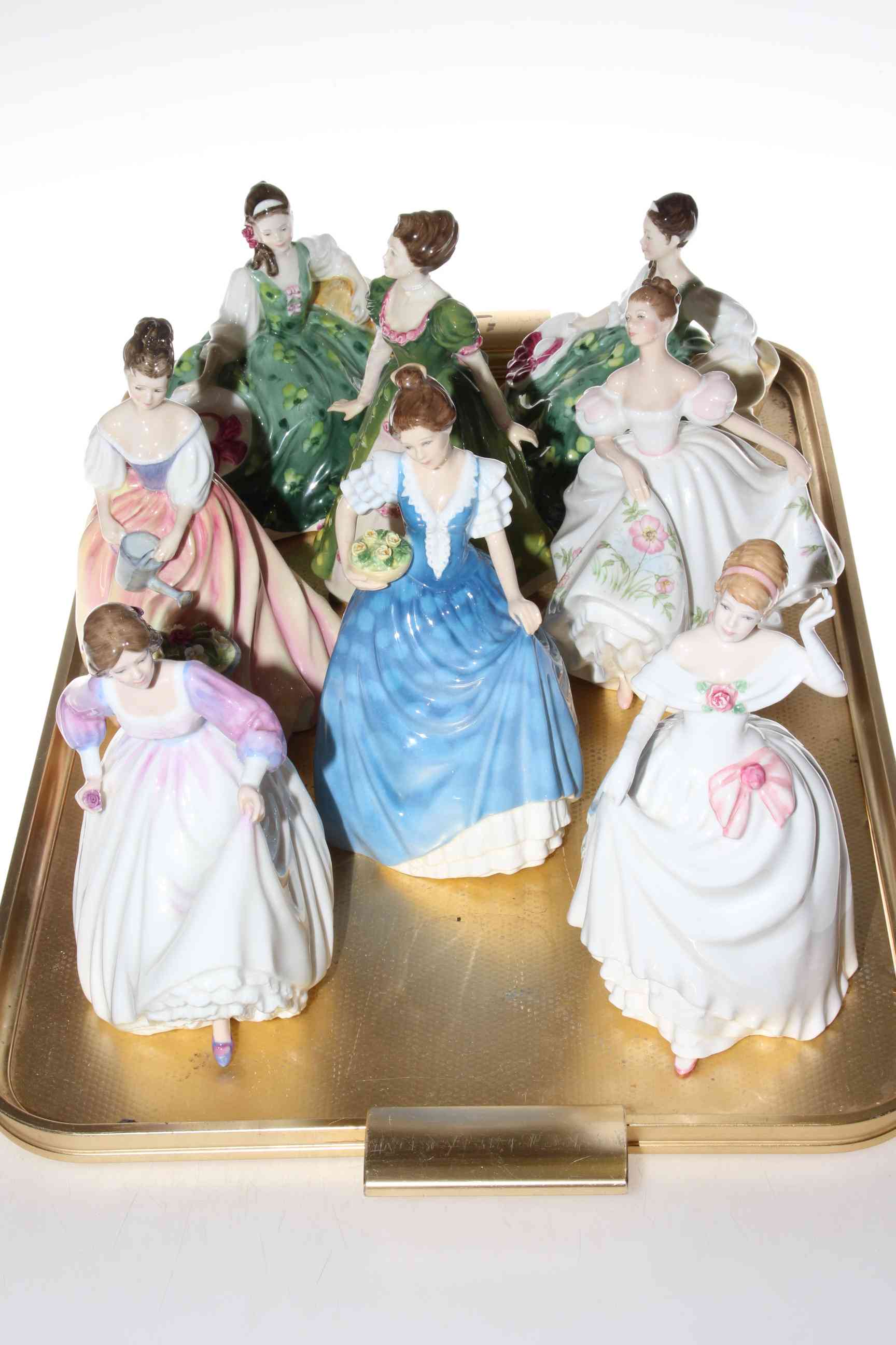 Eight Royal Doulton ladies 'Elyse' x 2, 'Gemma', 'Lucy', 'Alexandra', 'Helen', 'Ashley' and 'Dawn'.