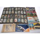 Cigarette cards and tea cards.