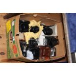 Collection of vintage cameras and accessories.