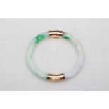 14 carat yellow gold and jade bangle.