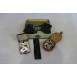 Tin and boxes of collectables including gold cufflinks, medals, watch, etc.