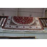 Keshan style carpet with a red ground, 2.80 by 2.00.