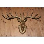 Brass model of a stags head.