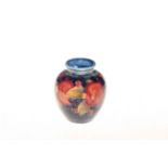 Moorcroft Pottery pomegranate vase, 13cm.