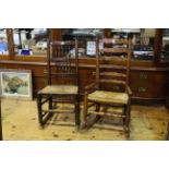 Two 19th Century oak rush seated rocking chairs.