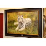 Framed painting of a white tiger, 59cm by 89cm.