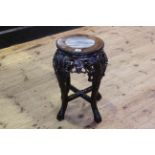 Oriental style hardwood and marble inset jardiniere stand, 49cm by 28cm diameter.