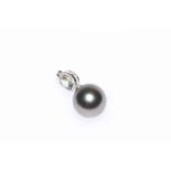 14 carat white gold pearl and sapphire pendant featuring one cultured Tahitian pearl with one oval