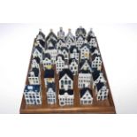 Collection of thirty four Delft KLM Bols houses.