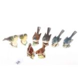 Collection of eight Beswick birds.