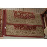 Pair Ziegler rugs with a tile red-cream ground 1.70 by 1.20.