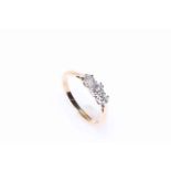 18 carat gold three stone diamond ring, size M.