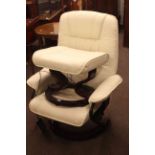 Stressless style cream leather electric thermal massage chair and footstool.