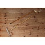 Antique polo mallet and an ivory silver collared walking stick (2).