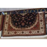 Keshan style carpet with a blue ground 2.80 by 2.00.