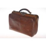 Late 19th Century pigskin Gladstone doctors bag with metal mounts.