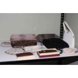 Eleven vintage handbags and purses including animal skin and beading.