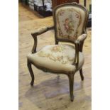 French fauteuil in floral needlework fabric.