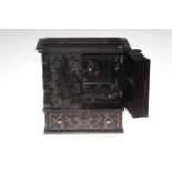Small ebonised cabinet with floral inlay, 37cm by 36cm.