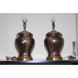 Pair of metal baluster shape table lamps.