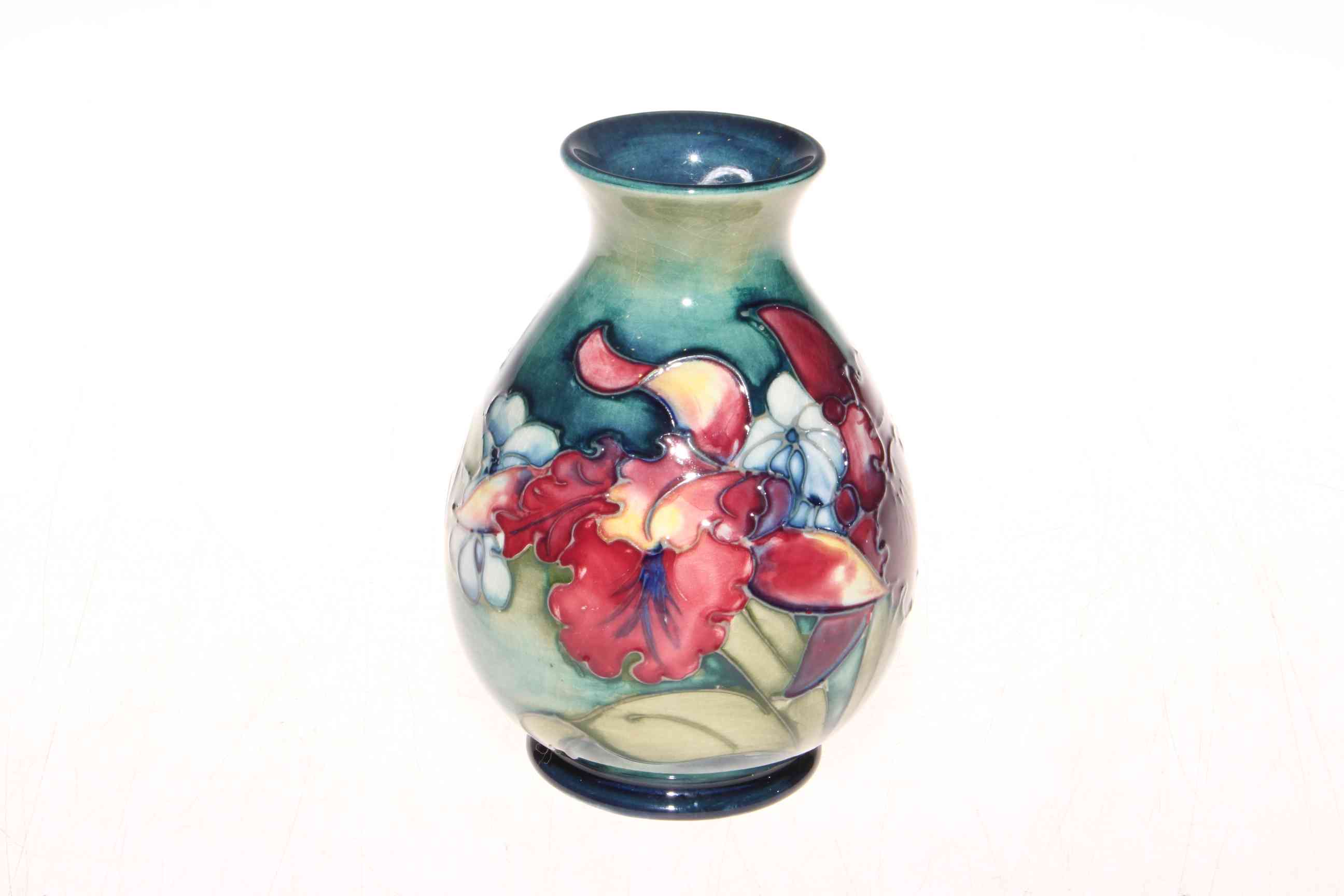 Moorcroft Pottery Orchids vase, 14cm.