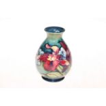 Moorcroft Pottery Orchids vase, 14cm.