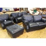 Black leather/PVC four piece lounge suite comprising three and two seater settee's,