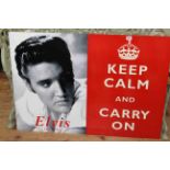 Two signs; Keep Calm and Carry On and Elvis.