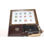WWII German Red Cross camera and framed German stamps including German Red Cross.