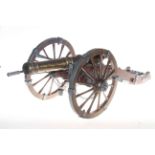 Large wood and brass cannon, 82cm.
