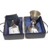 Cased silver portable communion set.