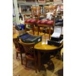 Continental oval extending dining table and six lattice back chairs including pair carvers.
