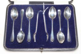 Set of six silver teaspoons and tongs, boxed.
