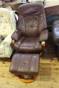 Stressless style brown leather swivel chair and stool.