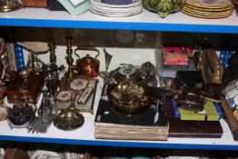 Shelf of LP records, cameras, cutlery, tennis racket, vanity set, metalwares, lamp.