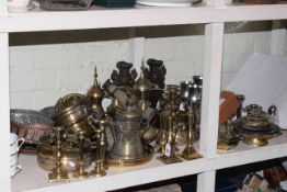 Collection of metalwares including teapots, goblets, candlesticks, vases.