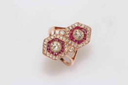 14 carat rose gold ruby and diamond ring featuring two round brilliant cut diamonds, approximate 0.