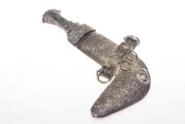 Arabian silver mounted ornate dagger and scabbard.