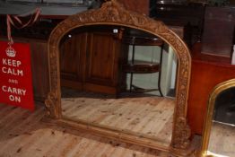 Large carved wood framed overmantel mirror.