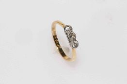 18 carat gold three stone diamond ring, boxed.