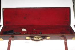 19th Century leather and brass bound gun case, 83cm.